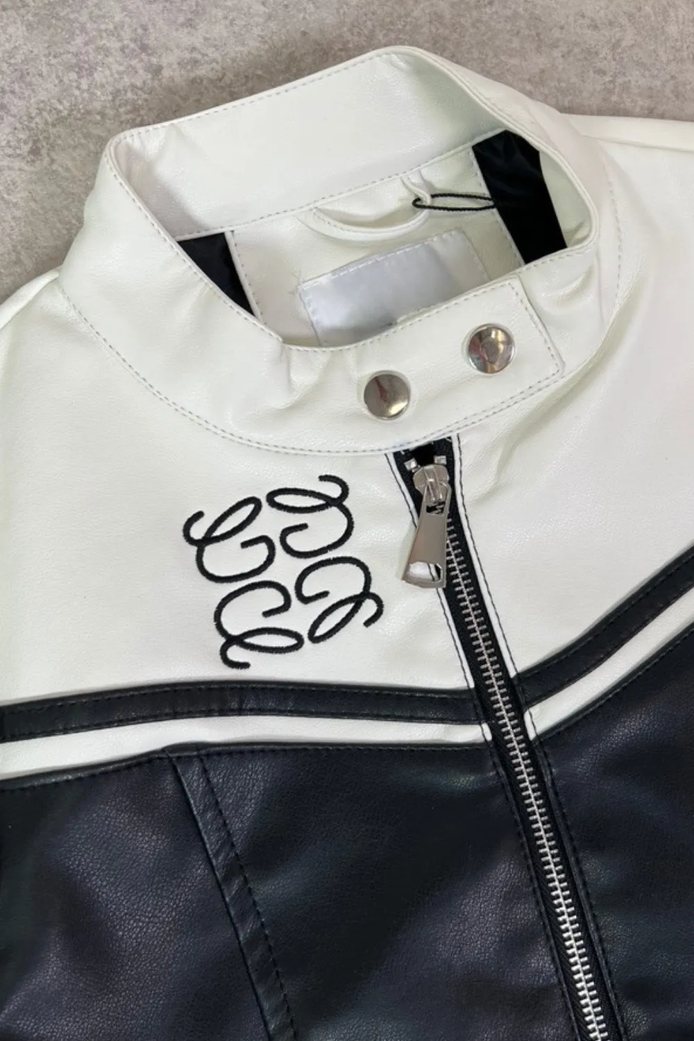 Gege black and white cropped faux leather biker jacket