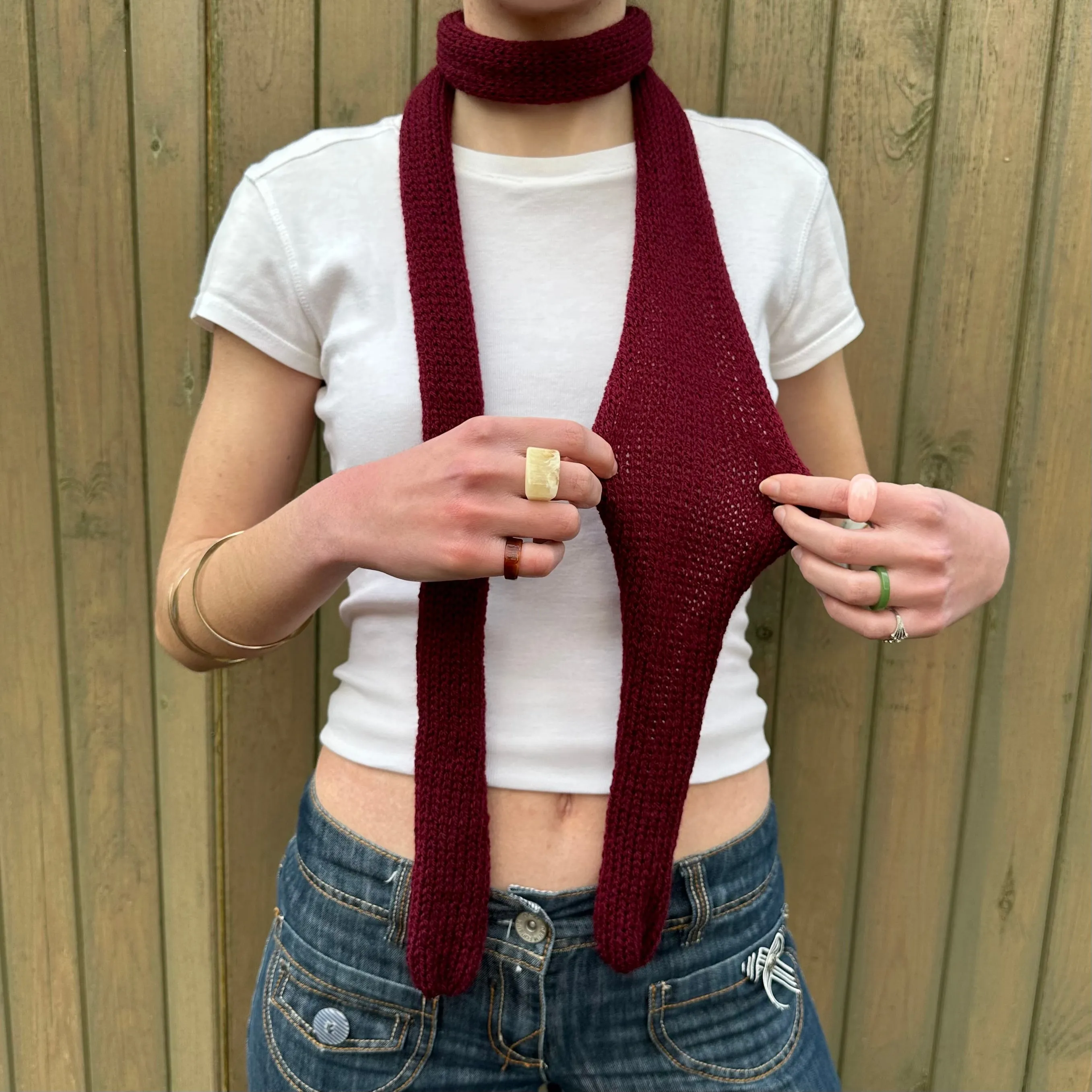 Handmade knitted skinny scarf in burgundy