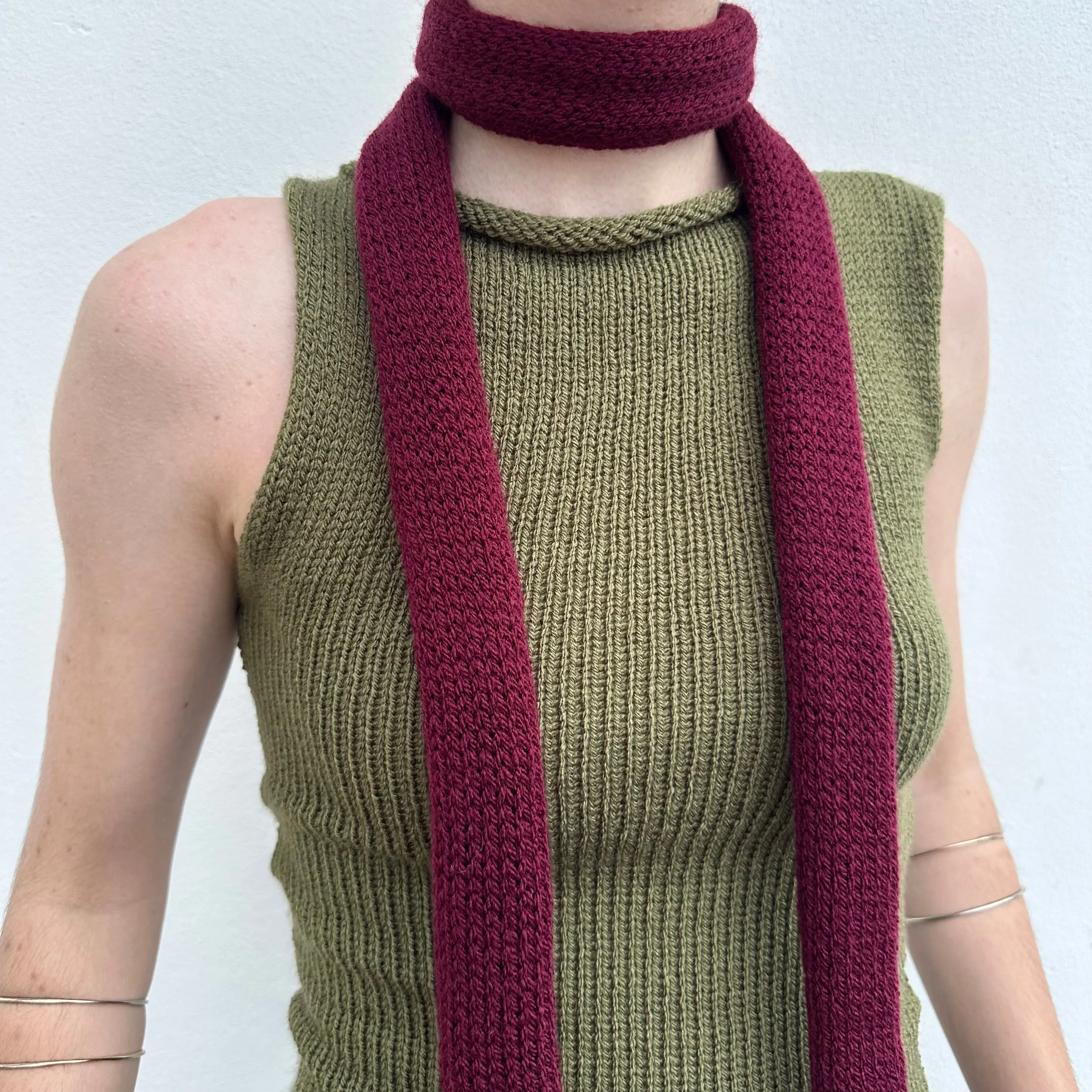 Handmade knitted skinny scarf in burgundy